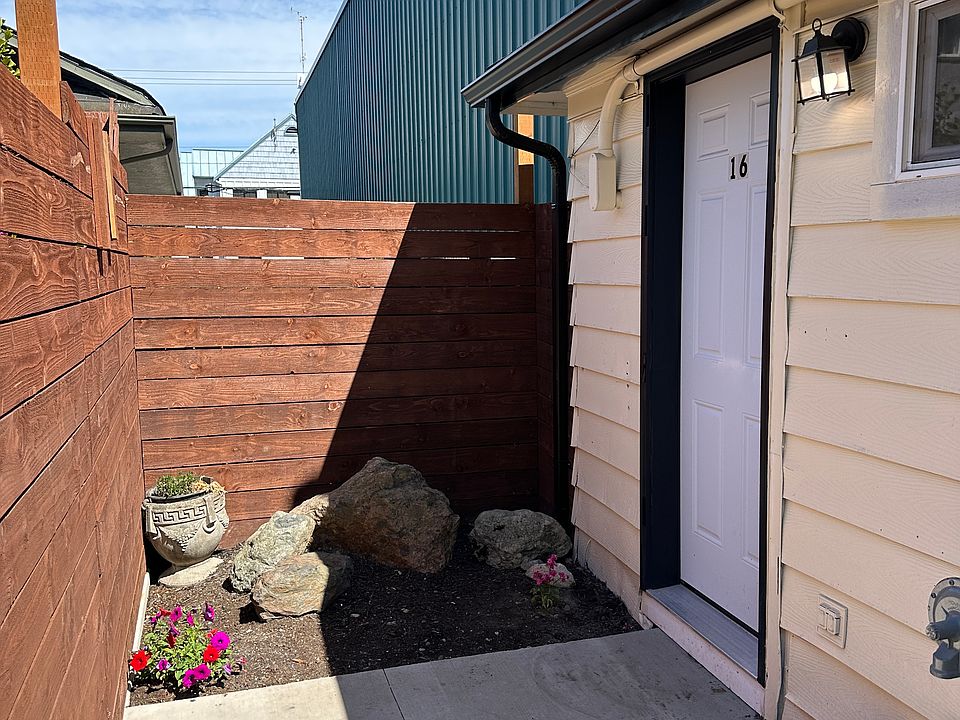 Back of duplex, entry door to #16