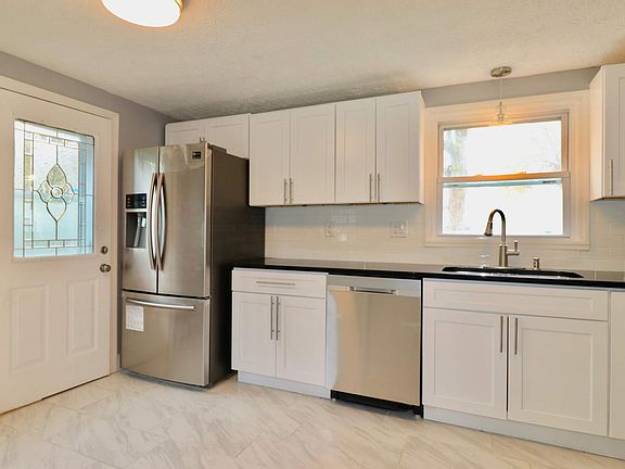 fully updated kitchen with all stainless steel appliances