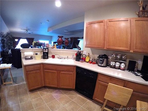 Looking over the breakfast bar into the living room.
