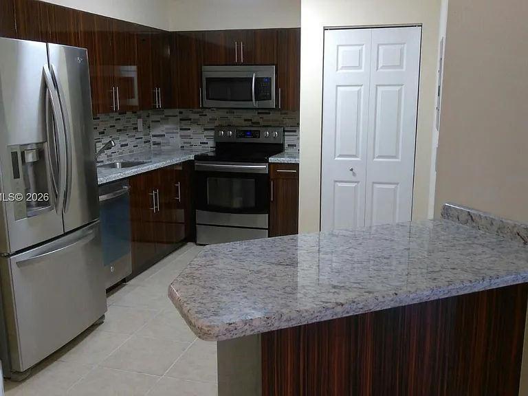 6195 NW 186th St #417 — Photo 1