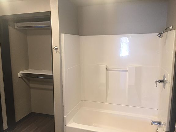 Spacious Closet and Sparkling Tub