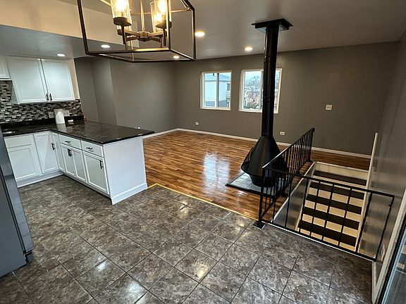 Kitchen to left, balcony door to the right