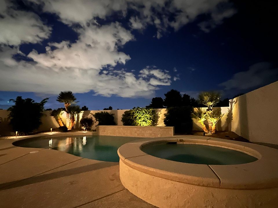Backyard with jacuzzi and heated pool