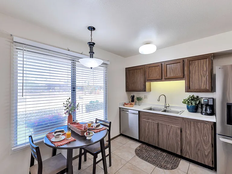 Spacious kitchen with new LG French door refrigerator, Bosch dishwasher and Samsung range.
