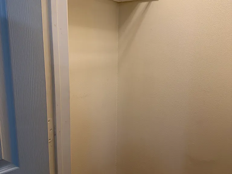 Bedroom #2 closet. Other side picture is missing.