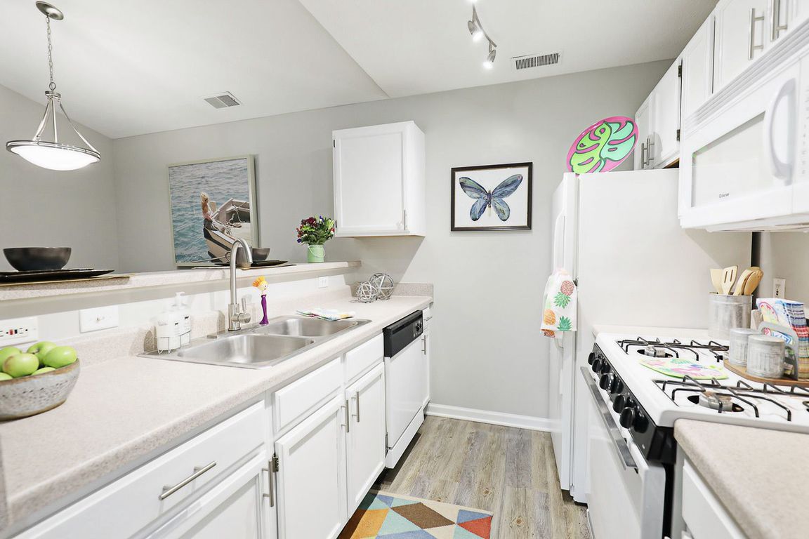 Bright, modern kitchen at Compass Pointewhere style meets everyday comfort.