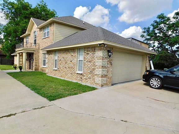 2 car garage with bulit in shelving