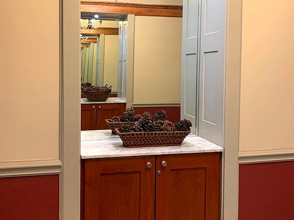 The beautifully detailed main entry features built-in storage for each unit.