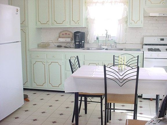 Kitchen with newly painted cabinets