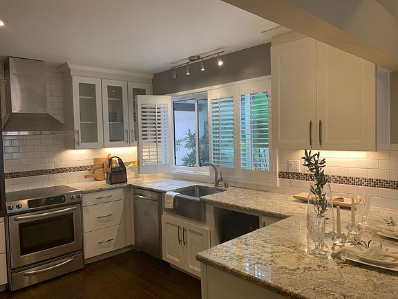 kitchen with white cabinets