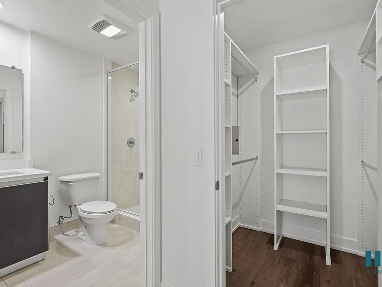 Bedroom with Bathroom and Walk-In Closet with Shelving