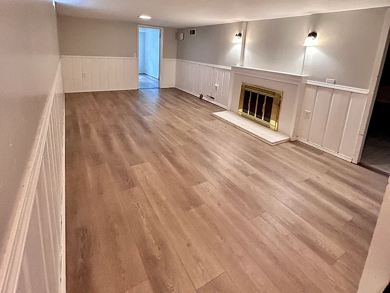 basement rec room with new LVP flooring