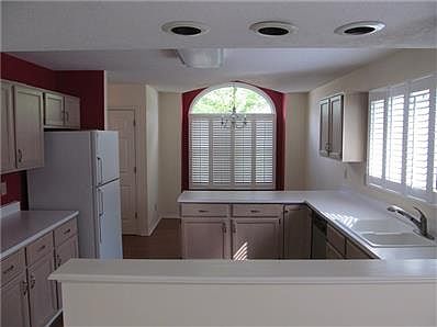 Kitchen looking through to the breakfast area.