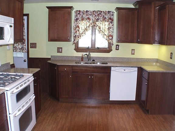 Custom fully equipped cherry kitchen