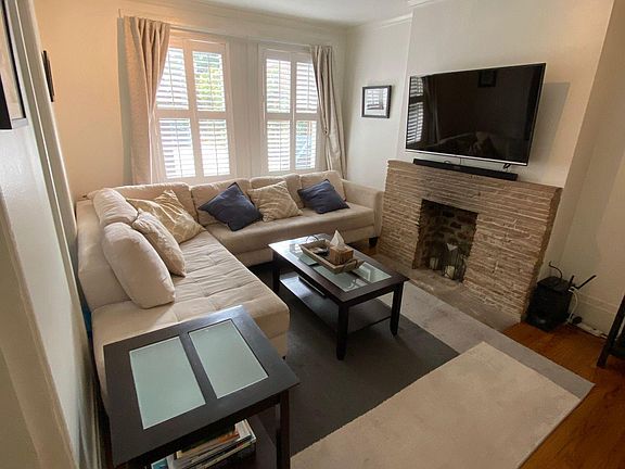 Living room with stone decorative fireplace