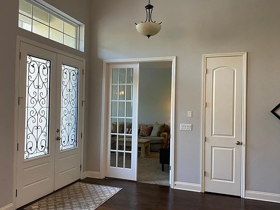 Main Foyer. French doors access to study, family room, or play room.