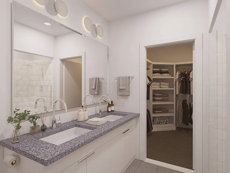 Bathroom with walk-in closet