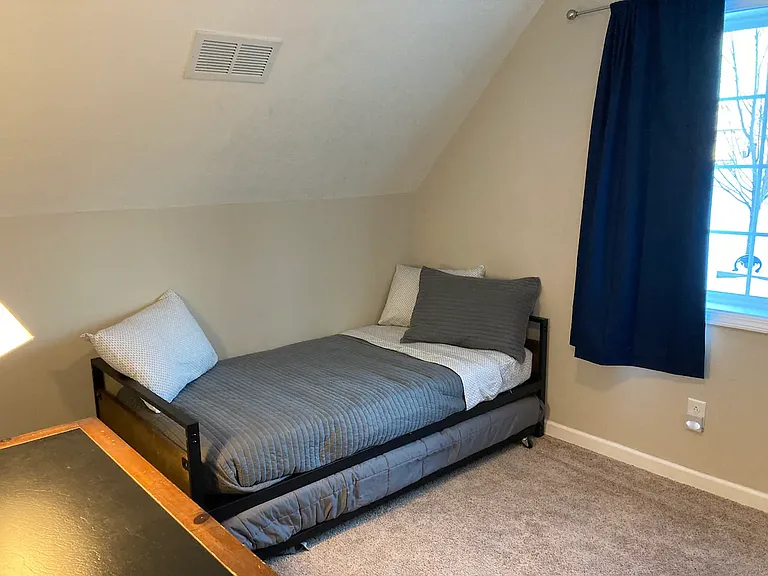 Bedroom 2. home does not come furnished. furnishing is for visual reference only.