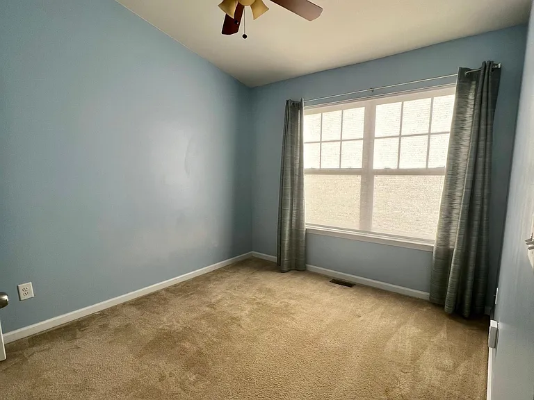 One of the two upstairs bedrooms