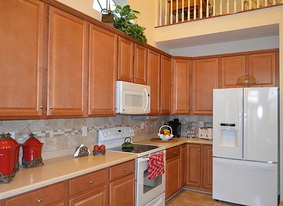 Kitchen w/Corian Counters and 42" cabinets