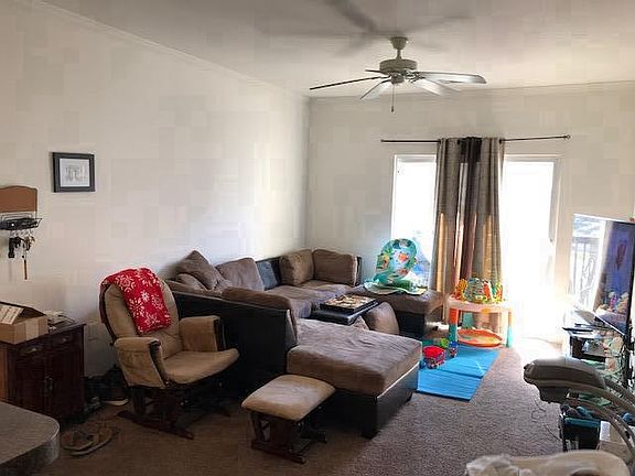living room with outdoor balcony