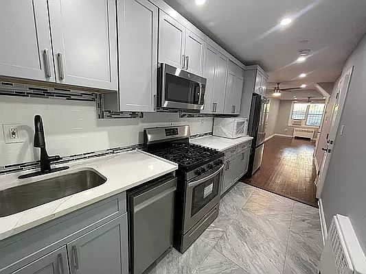 1st image of 21-15 73rd St