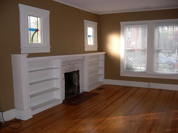 Living with fireplace & hardwood floor