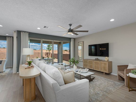 Enjoy open living spaces on the first floor of the Trento home design.