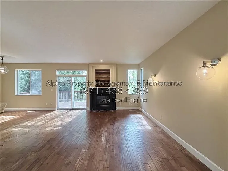 5758 NE Damsel Dr — Photo 3