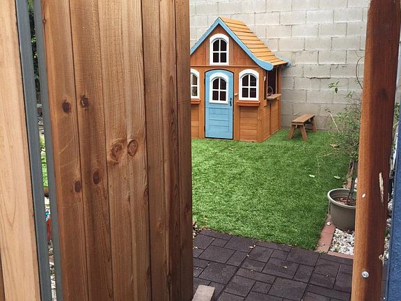Private gated backyard (playhouse not included)