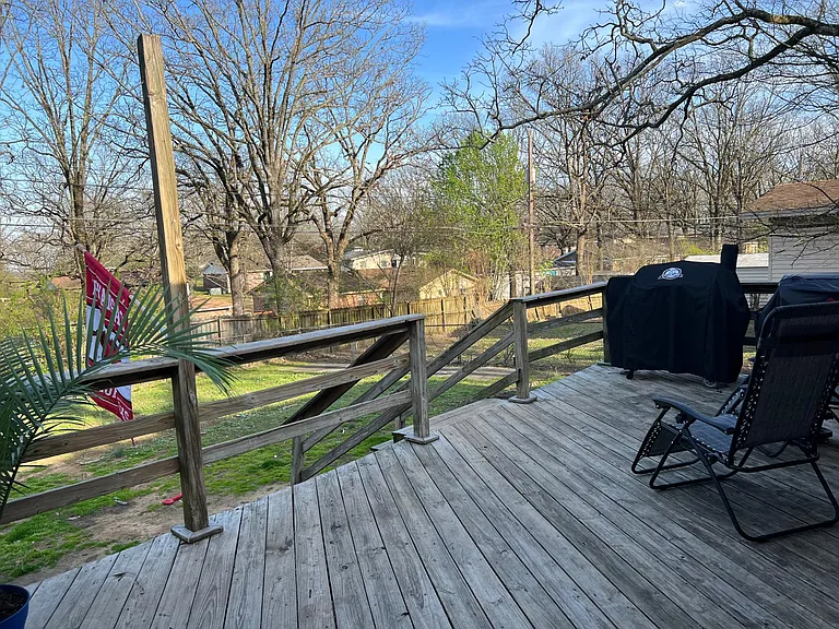 Back Deck off of Sunroom with fully fenced yard