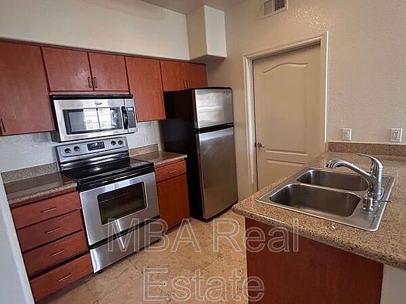 2nd image of 5302 E Van Buren St Unit 3036