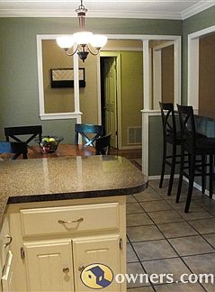 kitchen/dining room with crown molding