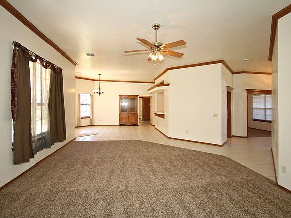 Open floor plan connects the family room, kitchen dining area, breakfast bar