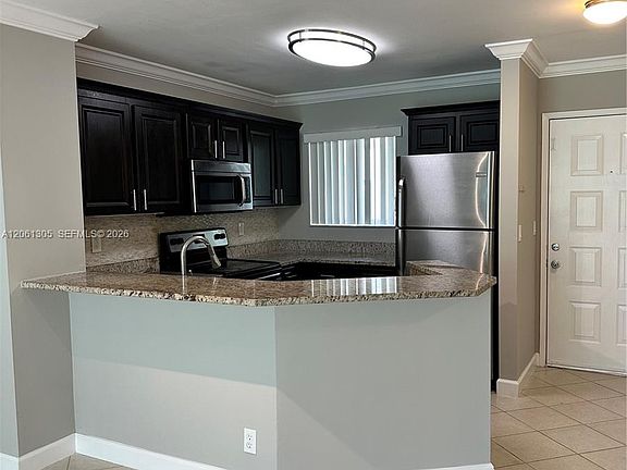 2nd image of 8750 N Sherman Cir APT 103