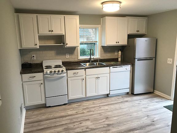 New cabinets, floor and appliances