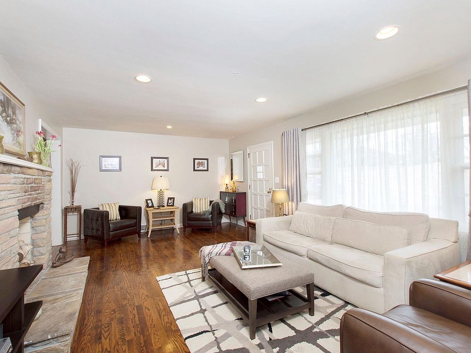 Sun Filled Living room with Fireplace.