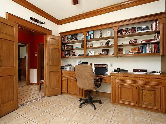 Gentleman's study with custom built desk.