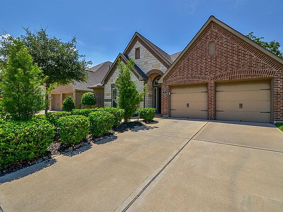 Curb appeal galore! Immaculate landscaping and gabled rooflline give this charming home a welcoming feel from the moment you pull up.