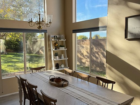 Dining room with large windows.