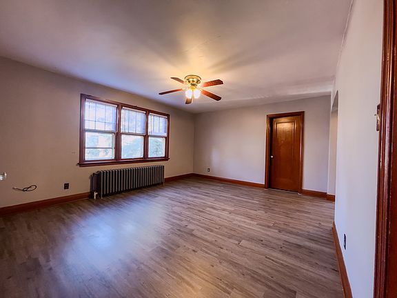 Unit entrance, living room with large closet attatched