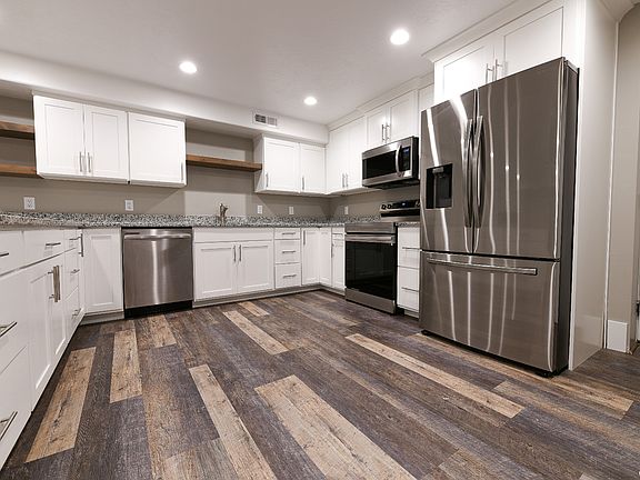 Stove, oven, fridge, microwave and dishwasher.
