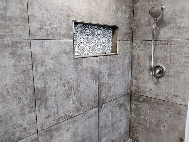 Porcelain tile in new renovated bathrooms.