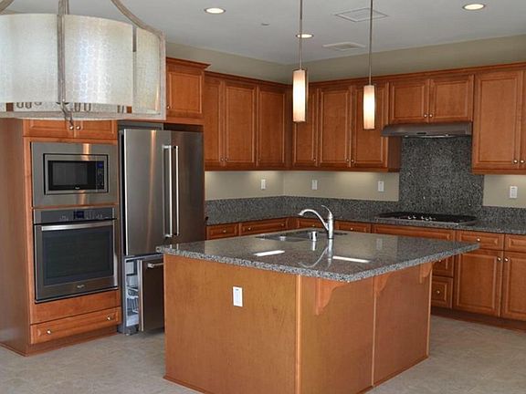 Newly-remodeled kitchen with stainless steel appliances