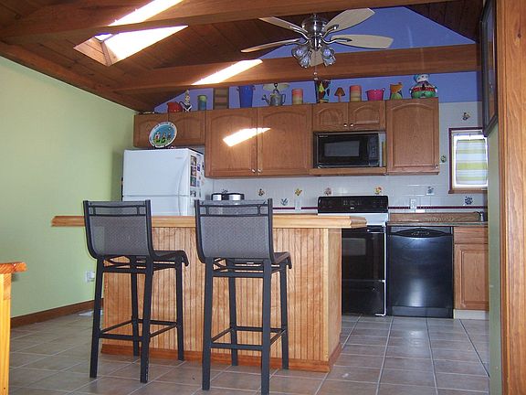 Large kitchen with custom built island