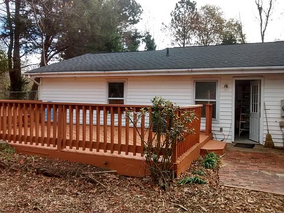 This is the adjoining deck. Your deck is screened in and has a roof.
