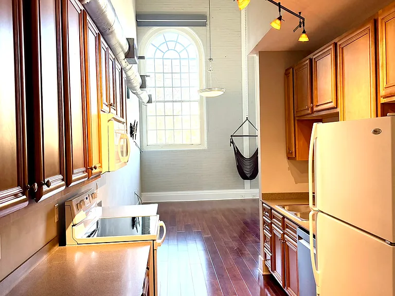 Kitchen hallway leading into main living room