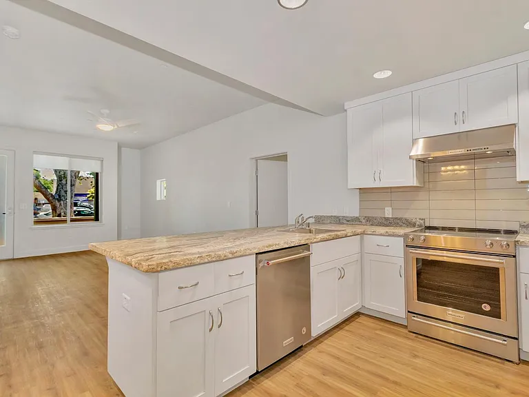 Kitchen view towards living area