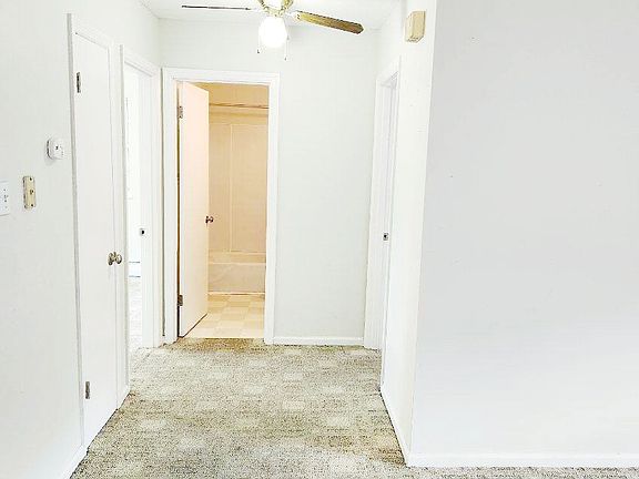 Hall to bath & bedrooms - with linen closet.