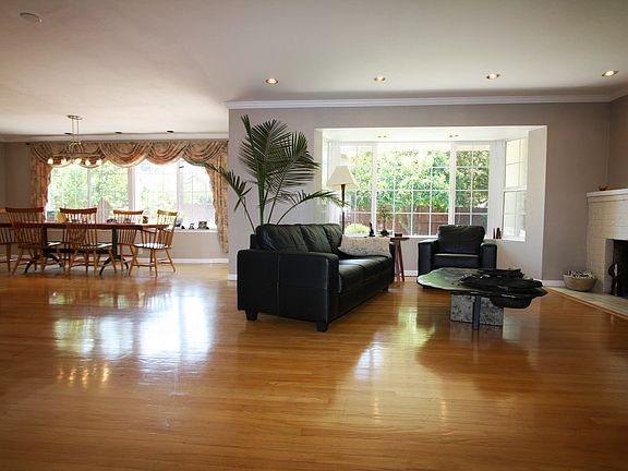 Zoomed out view of living room and dining room